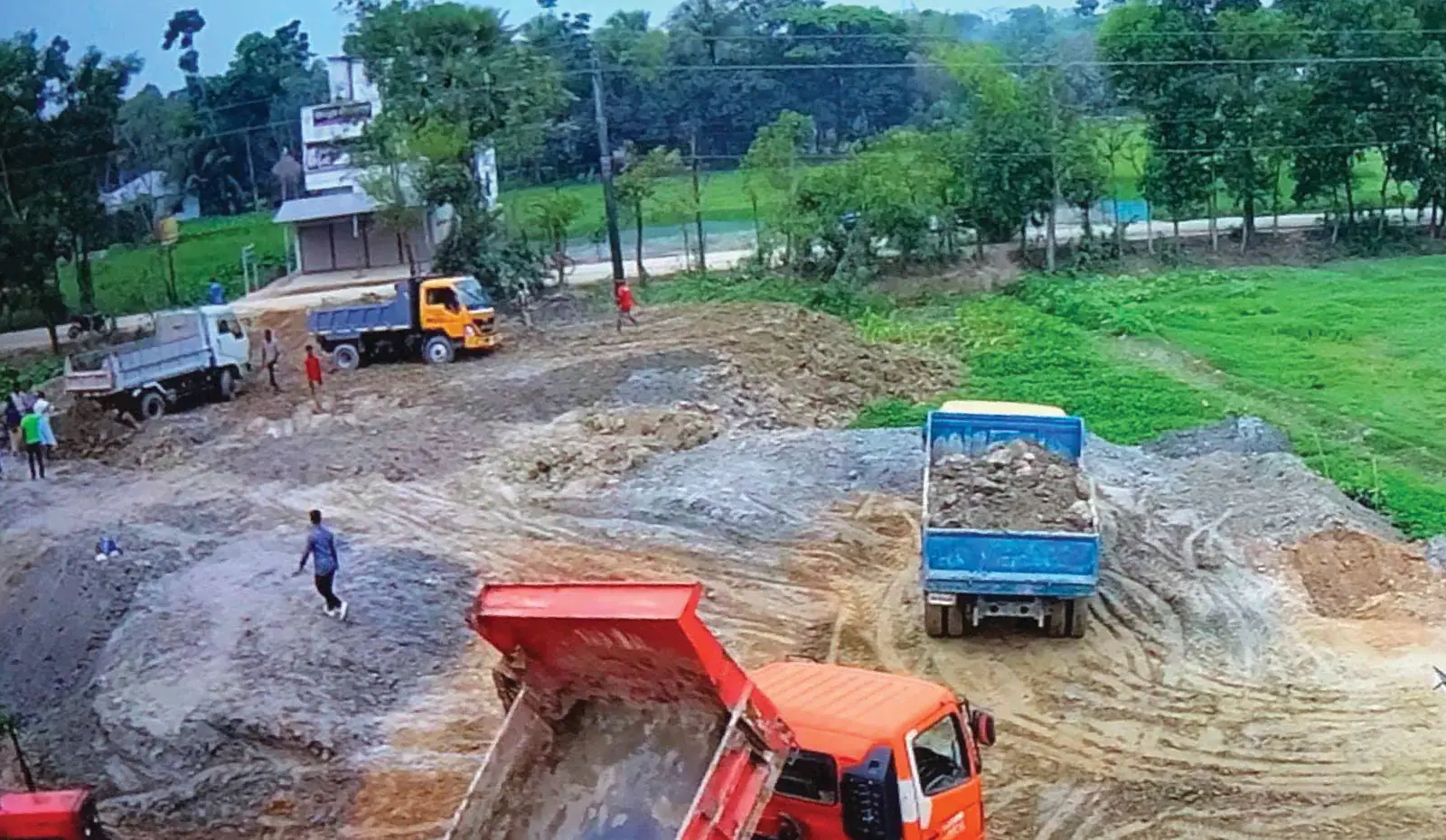 Trucks levelling the site of Karmo Industrial Park Unit 2 in Feni