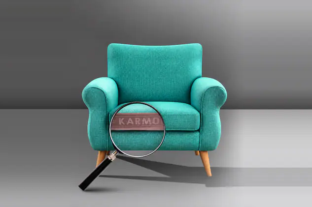 Karmo foam armchair with a magnifying glass on the KARMO label
