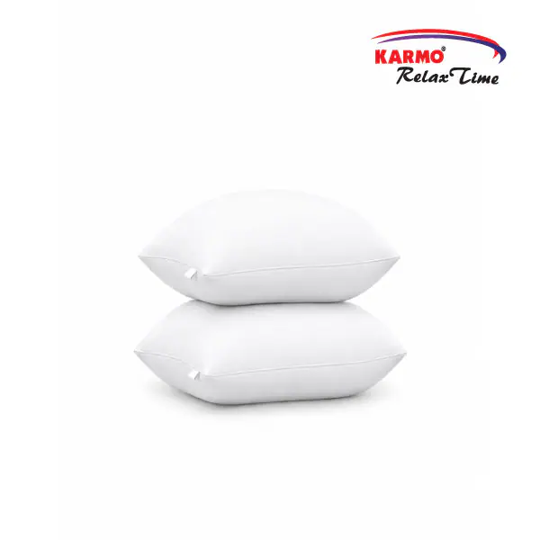 Two stacked white Karmo Relax Time cushions